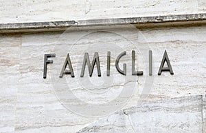 big text FAMIGLIA that means family in Italy photo