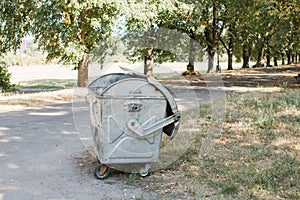 Big trash can in the forest