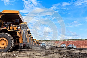 Big truck in open pit and blue sky