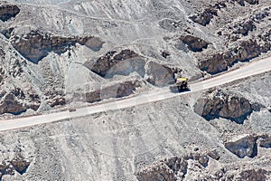 Big trucks and machinery at Chuquicamata, world`s biggest open pit copper mine, Calama, Chile. Mining Operations at open pit