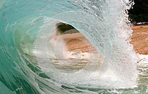 Big Tubing Wave on the Beach