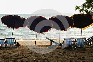 Big umbrella on the beach with Seaview Pattaya, Thailand.