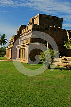 Big unfinished and ruined facade with garden of the ancient Brihadisvara Temple in Gangaikonda Cholapuram, india.