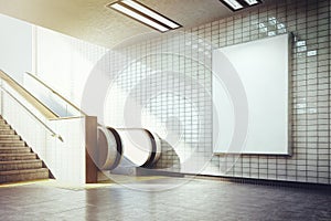 Big vertical blank billboard with escalator photo