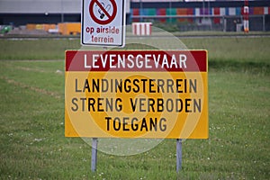 Big warning sign along the runway of Amsterdam Schiphol Airport
