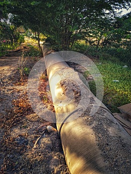 Big water pipe line covered with dirt