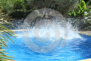 Big water splash in the pool