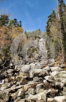 Big waterfall among the forest sight