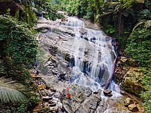 Big waterfall in the green tropical forest