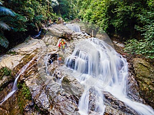 Big waterfall in the green tropical forest