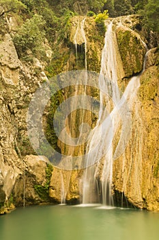 Big waterfall Kadi in Polilimnio in Greece photo