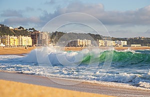 Big wave in Atlantic Ocean on the beach in NazarÃ©, Portugal photo