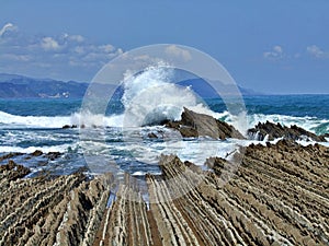 Big wave on the beach of Zumaia in Basque country in Spain