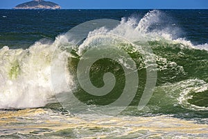 Big wave breaking at Ipanema beach