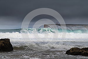 A big wave breaking at the Tonel Beach Praia do Tonel in Sagres, Algarve, Portugal