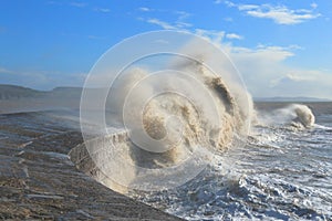 Big wave splashing on The Cobb