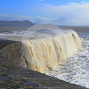 Big wave splashing on The Cobb