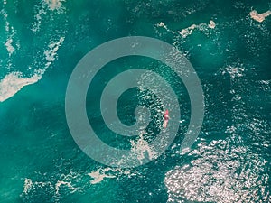 Big wave surfer in ocean. Aerial view