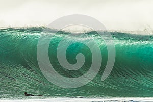 Big Wave Surfer Paddling