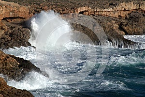 Big waves breahing on rocks of Mallorca