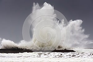 Big waves breaking on Plentzia breakwater