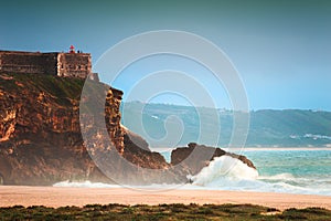Big waves on the coast of Atlantic ocean in Nazare, Portugal