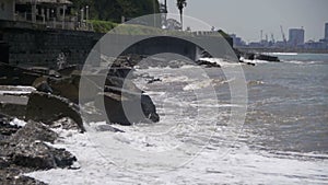 Big Waves Crashing on Stone Beach. Slow Motion