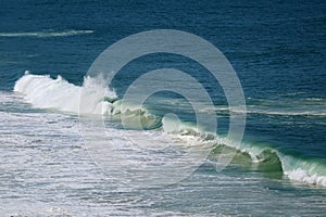 Big waves on the deep blue Atlantic ocean at Copacabana beach, Rio de Janeiro, Brazil, South America