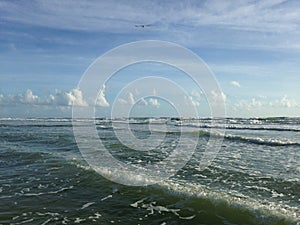 Big Waves with Foam Rolling on Daytona Beach at Daytona Beach Shores, Florida.