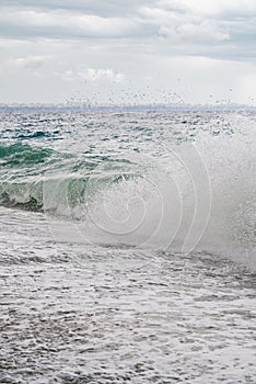 big waves hitting the Konyaalti coast on a stormy day