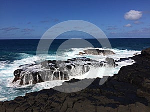 Big Waves in Queen`s Bath in Princeville on Kauai Island, Hawaii. photo