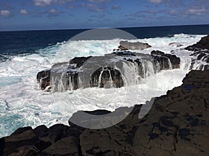 Big Waves in Queen`s Bath in Princeville on Kauai Island, Hawaii. photo