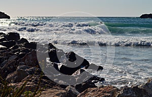 Big waves in a rocky beach