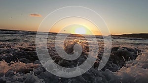 Big Waves On A Sea Beach At Sunset. Beautiful Waves Of Slow Motion Video On The Santorini