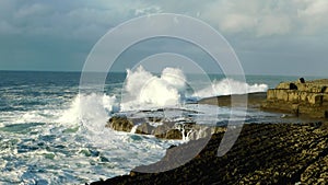 Big waves splashing on the coast in Doolin, Ireland