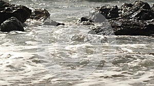 Big waves splashing on the rocks in Koijigahama Beach in Tahara Japan