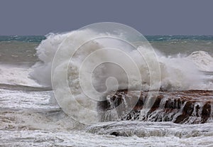 Big waves on a stormy day on Torrevieja`s rocky coast.