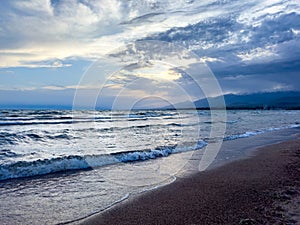 Big waves. stormy sea, thunderclouds. Kyrgyzstan, Lake Issyk-Kul