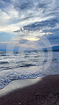 Big waves. stormy sea, thunderclouds. Kyrgyzstan, Lake Issyk-Kul