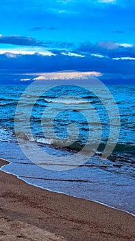 Big waves. stormy sea, thunderclouds. Kyrgyzstan, Lake Issyk-Kul