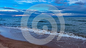 Big waves. stormy sea, thunderclouds. Kyrgyzstan, Lake Issyk-Kul