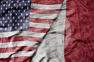 big waving colorful flag of united states of america and national flag of malta on the dollar money background. finance concept