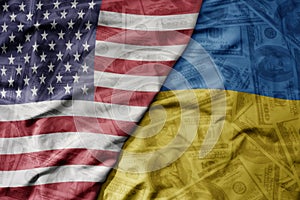 big waving colorful flag of united states of america and national flag of ukraine on the dollar money background. finance concept