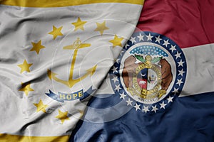 big waving colorful national flag of missouri state and flag of rhode island state