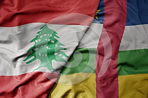 big waving national colorful flag of central african republic and national flag of lebanon