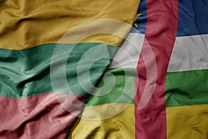 big waving national colorful flag of central african republic and national flag of lithuania