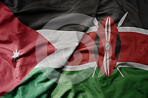 big waving national colorful flag of kenya and national flag of jordan