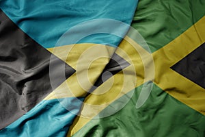 big waving realistic national colorful flag of bahamas and national flag of jamaica