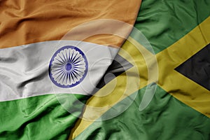 big waving realistic national colorful flag of india and national flag of jamaica