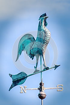 Big on a weathervane. Metal Weathercock pointing south west